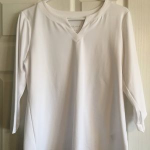 White top with 3/4 length sleeves.